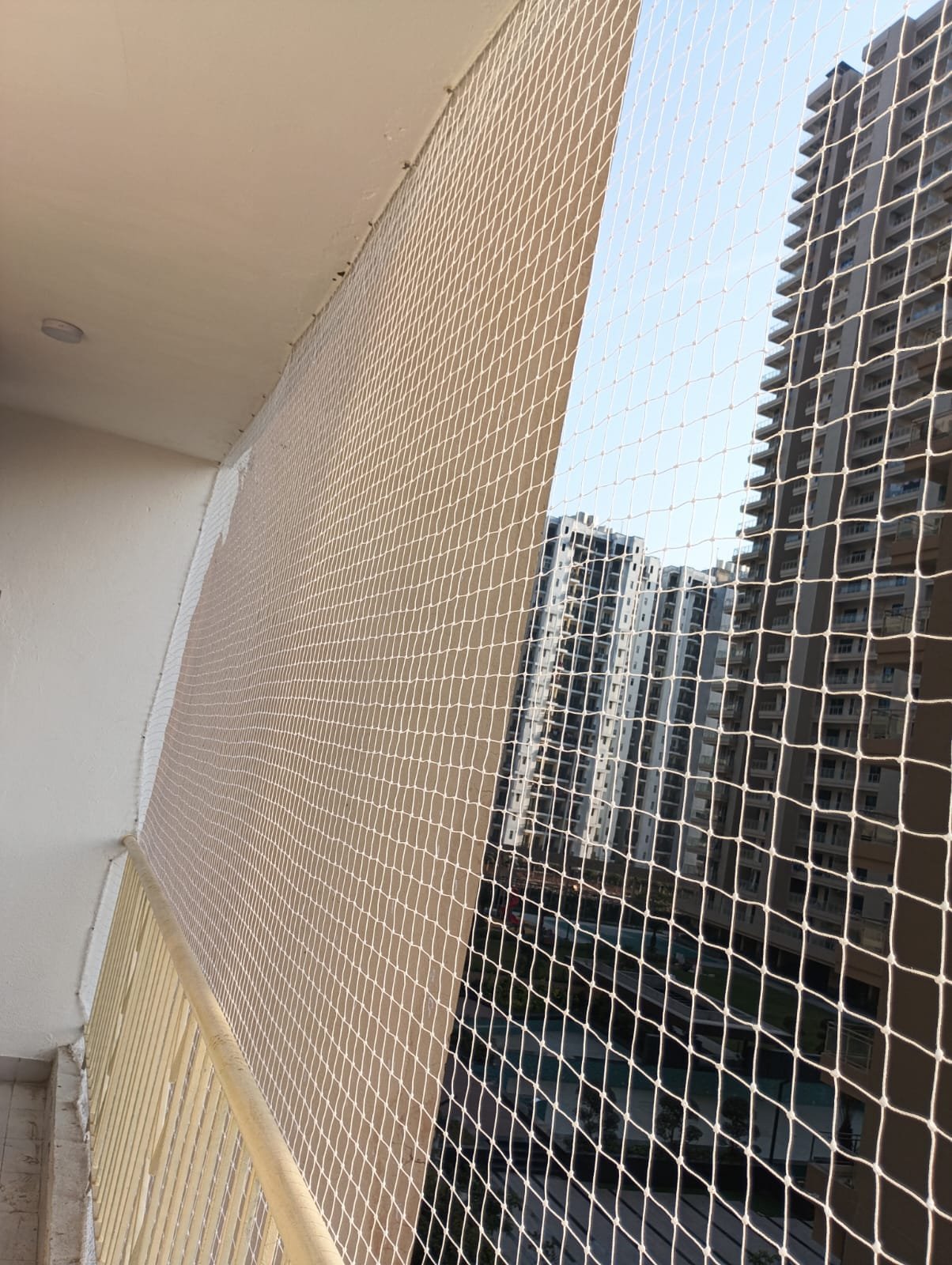Durable balcony pigeon net and anti-bird safety mesh installed in Greater Noida high-rise